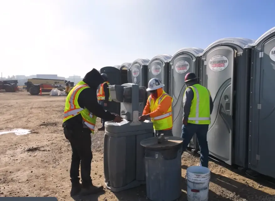 workers are using potty cabins