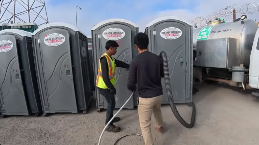 workers servicing restrooms